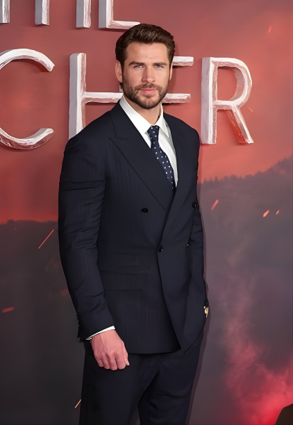 Liam Hemsworth Commands the Red Carpet in a Classic Navy Double-Breasted Suit